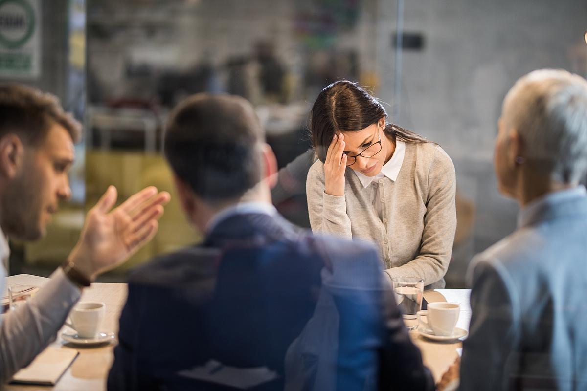 woman frustrated during a business meeting