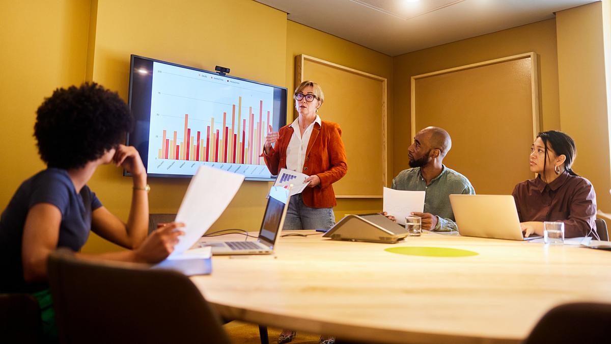 meeting in a conference room going over business growth